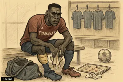 A caricature of injured defender Moïse Bombito sits in a locker room, clutching his leg beside untouched football gear and empty lockers.